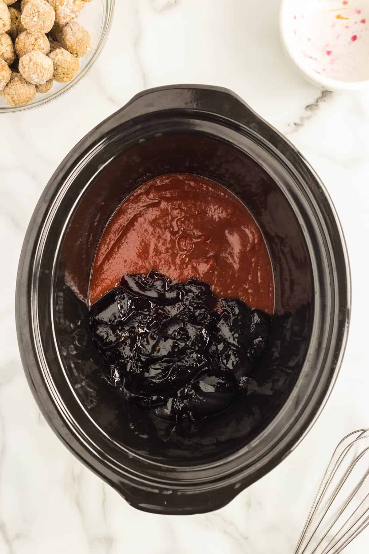 Grape jelly and chili sauce in crock pot for Grape Jelly Meatballs