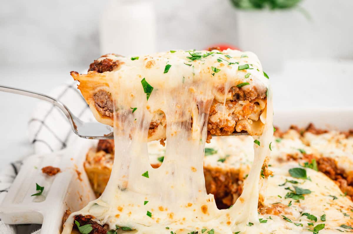 Easy Lasagna in baking dish cut and ready to enjoy