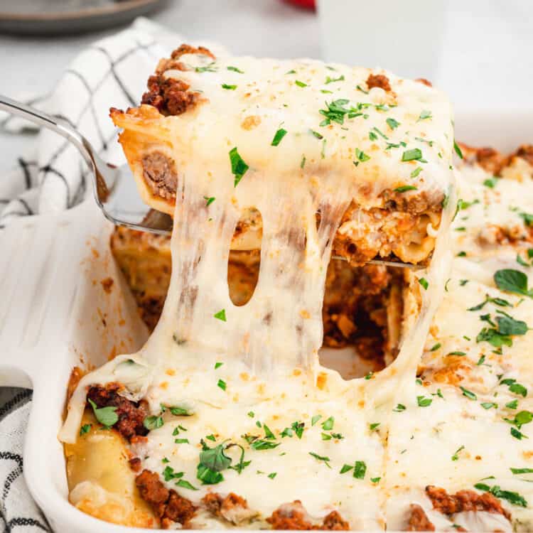 Easy Lasagna in baking dish cut and ready to enjoy