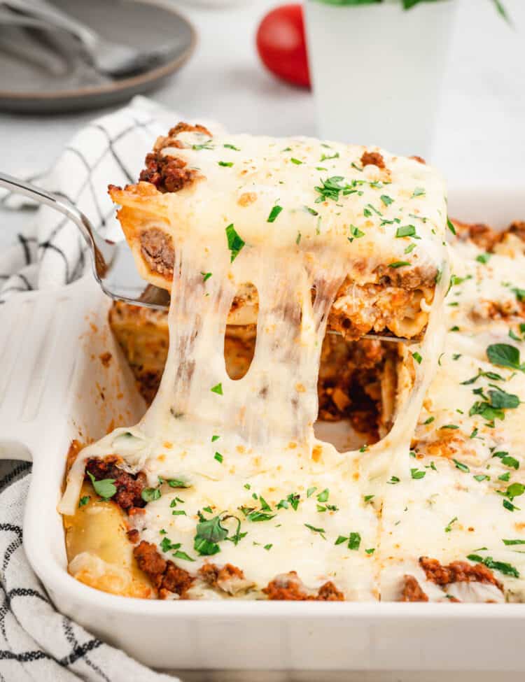 Easy Lasagna in baking dish cut and ready to enjoy