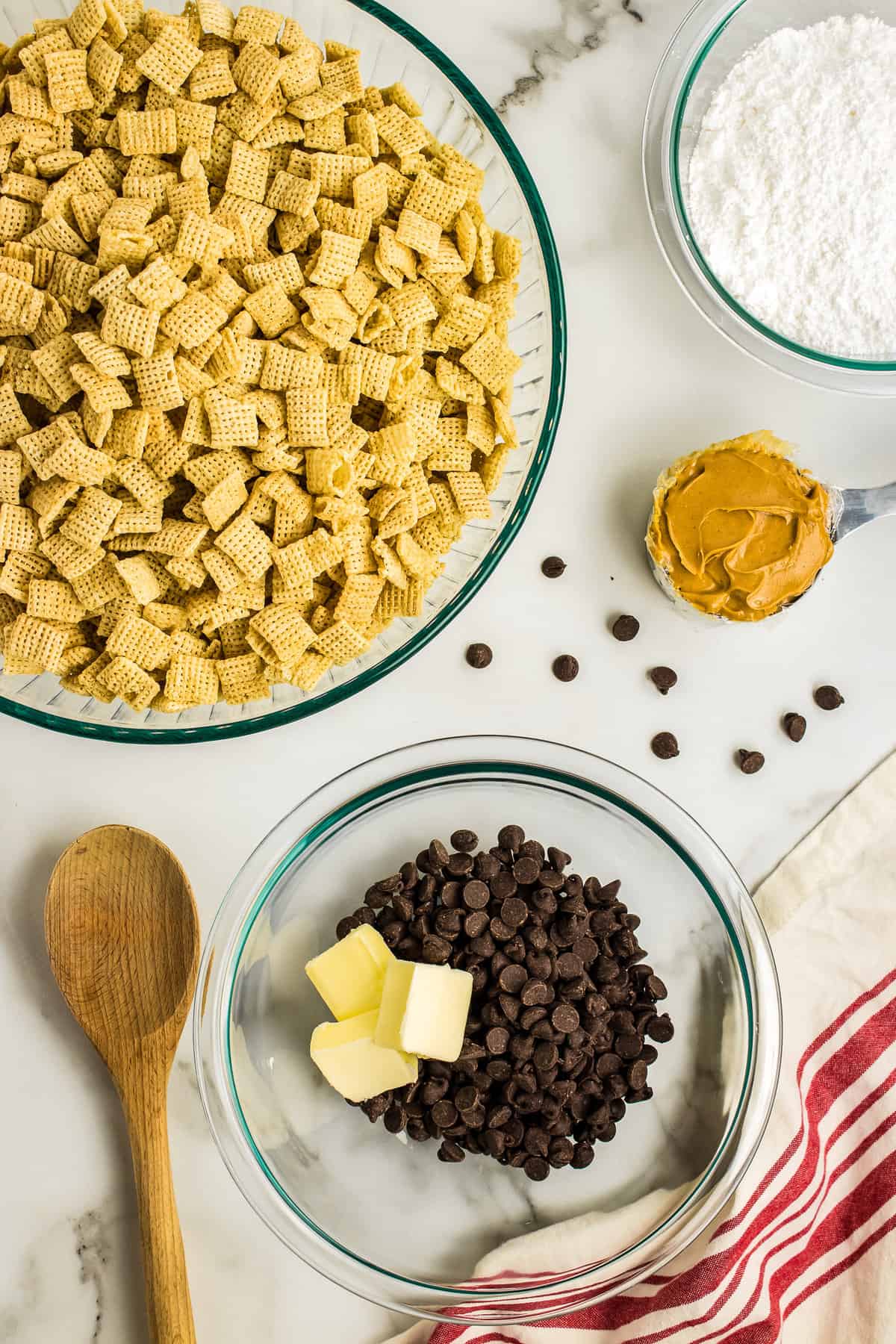 Put cereal in a large bowl and set aside. in a Small microwave safe bowl add the chocolate chips and butter.