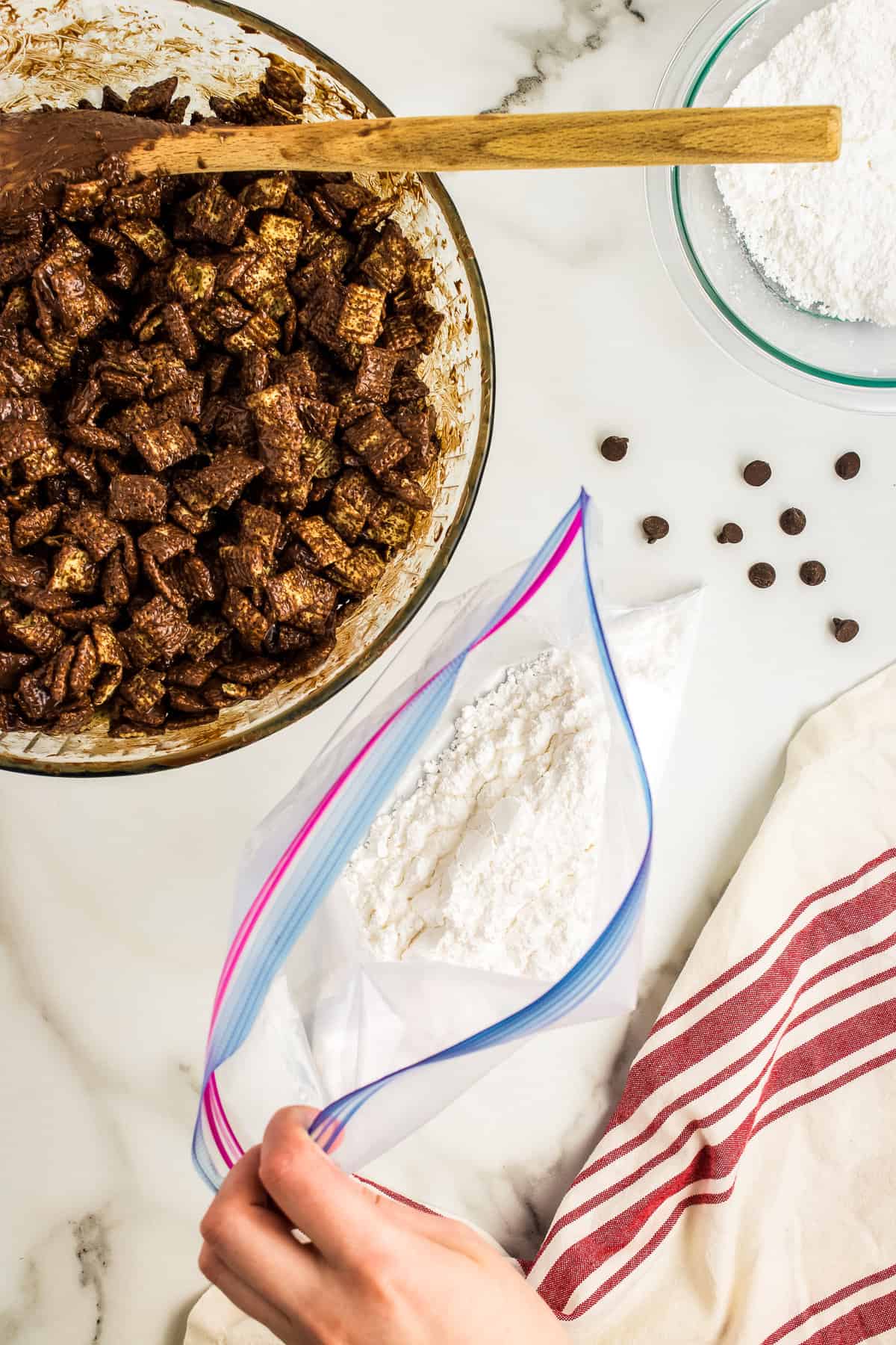 Put powdered sugar into a gallon zip lock bag