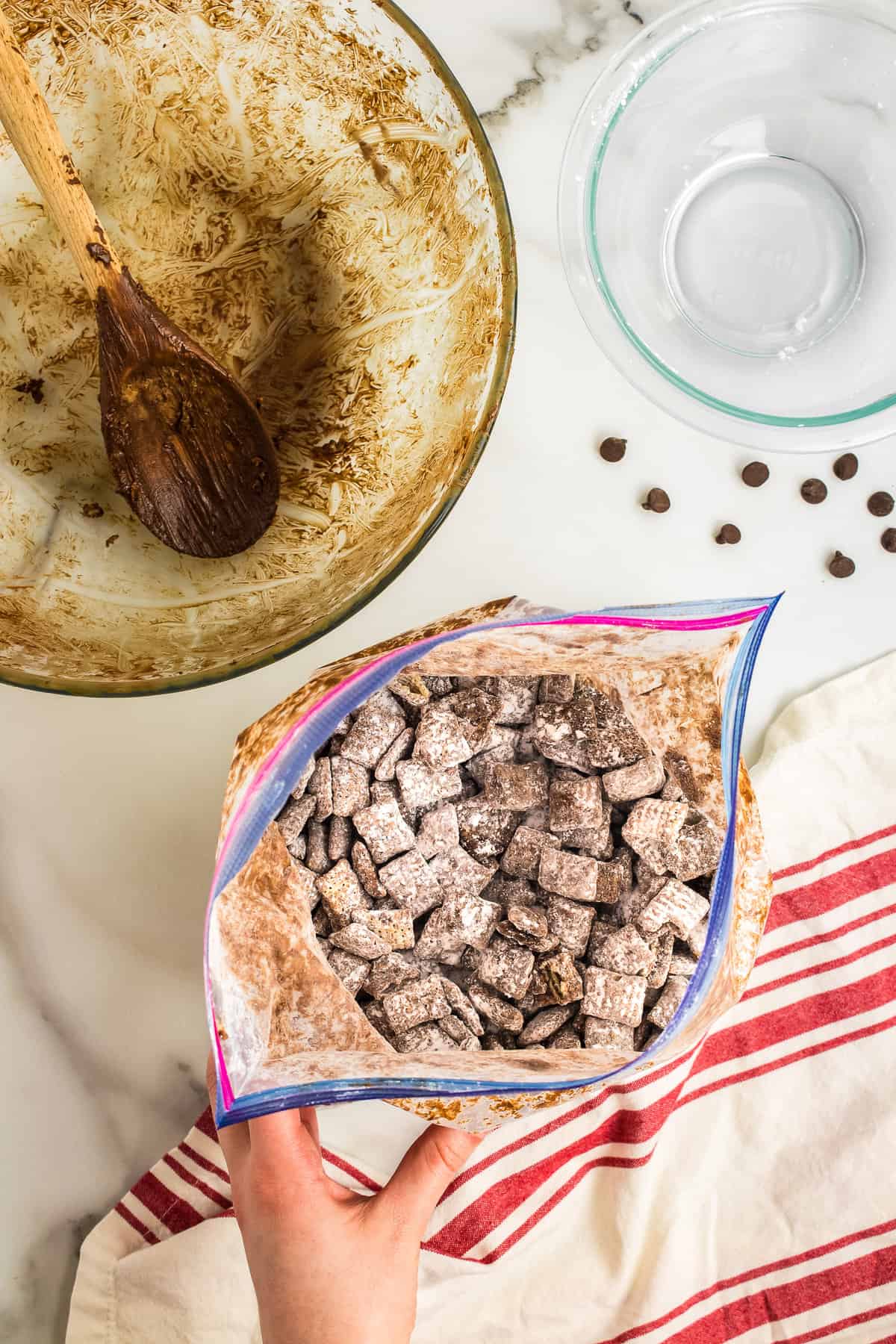 Add coated cereal to the powdered sugar and shake well until all pieces are covered with powdered sugar.