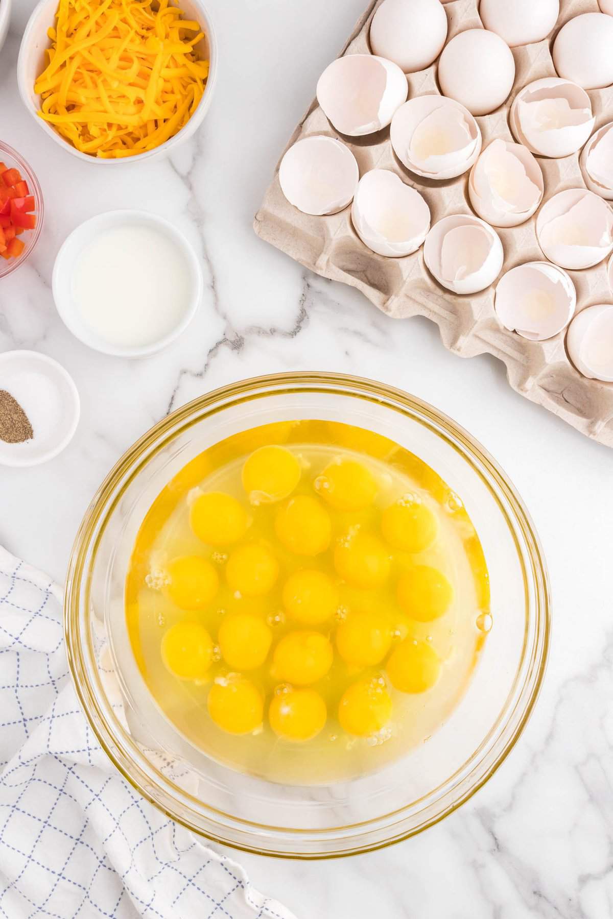 Eggs in mixing bowl for Sheet Pan Eggs Recipe