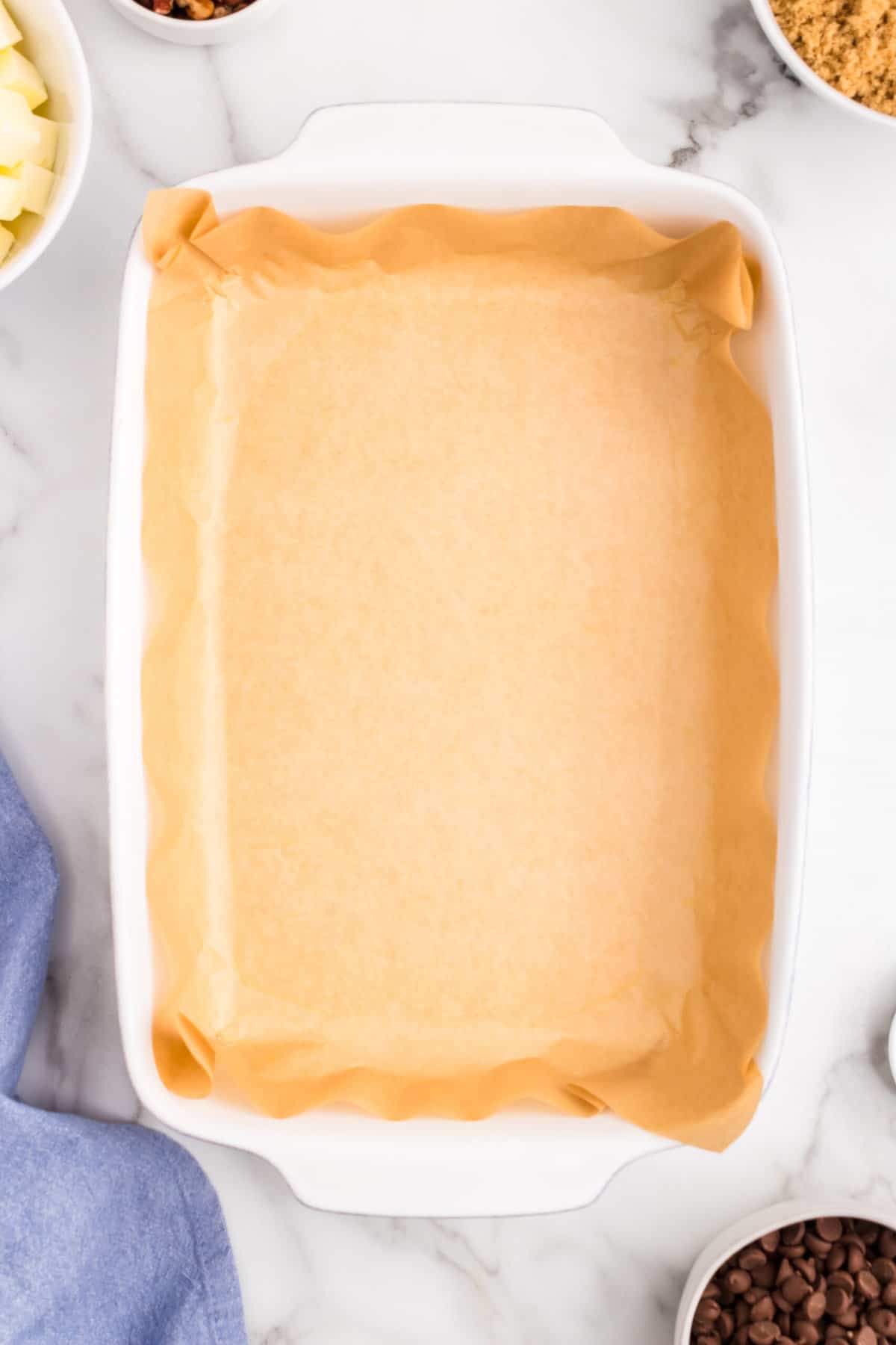 Lining baking pan with parchment paper for Toffee recipe