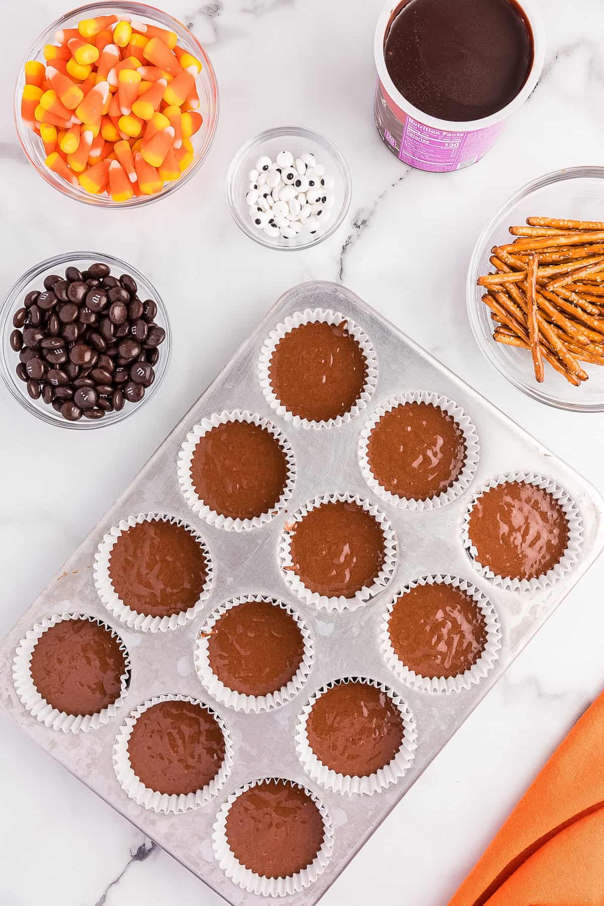 Pour Evenly into 24 cupcake baking sheet.