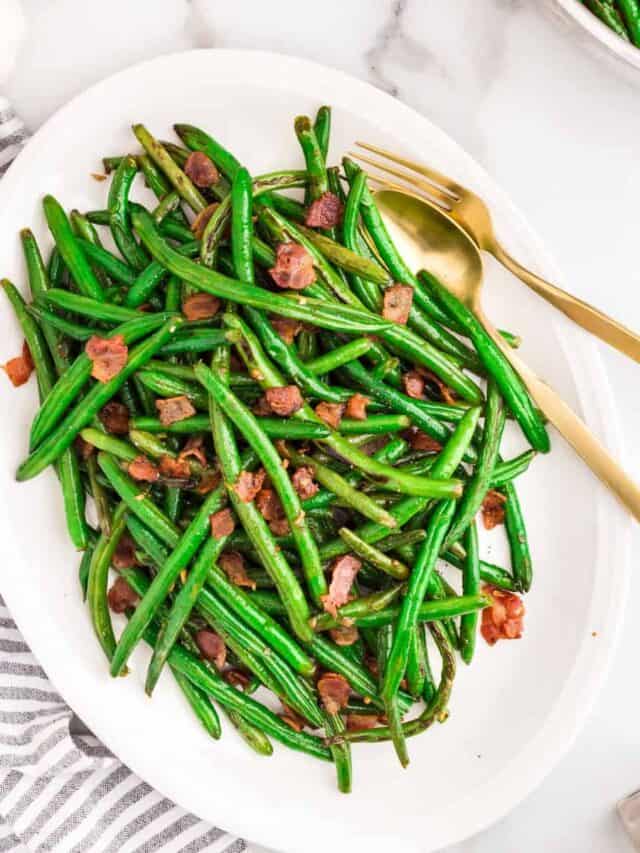 Green Beans with Bacon in white serving dish
