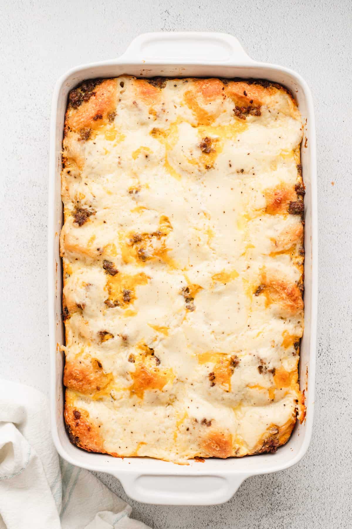 Overnight Bicuits & Gravy Casserole in baking dish hot out of the oven