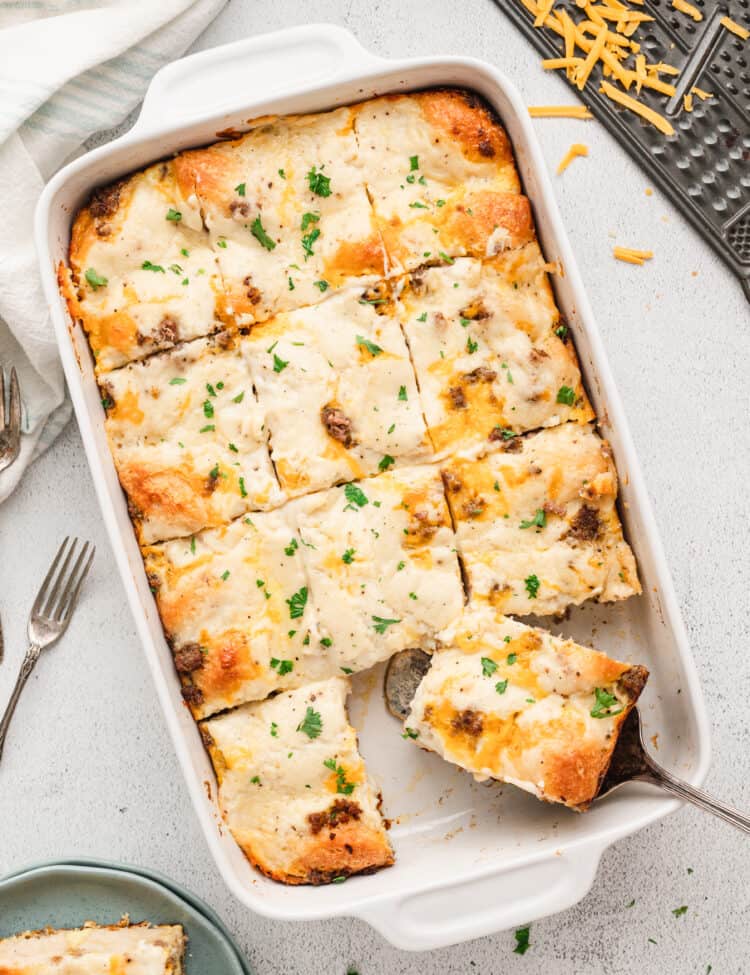 Overhead image of Biscuits & Gravy Casserole cut into pieces