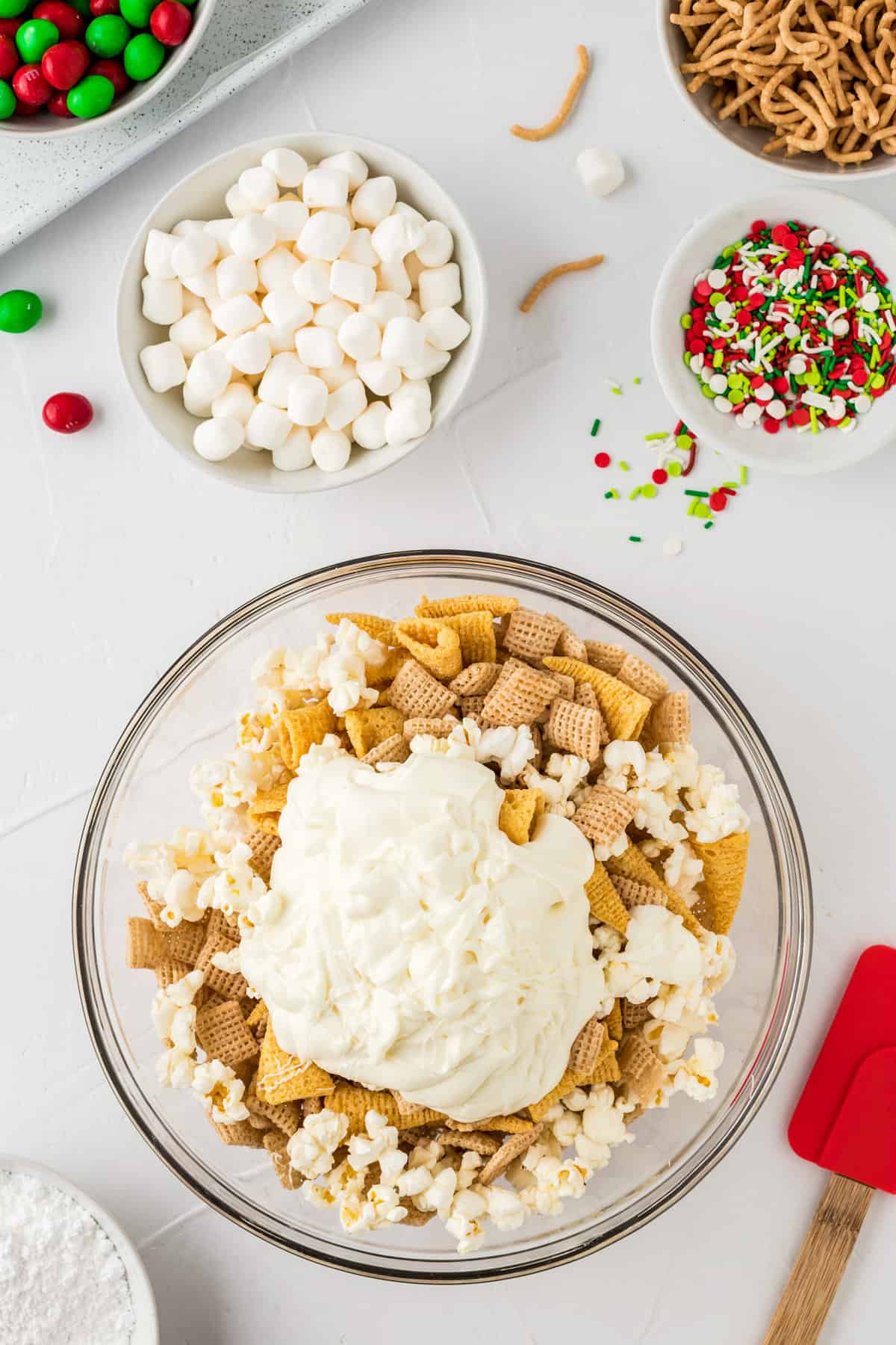 Pour melted white chocolates onto the snack bowl.