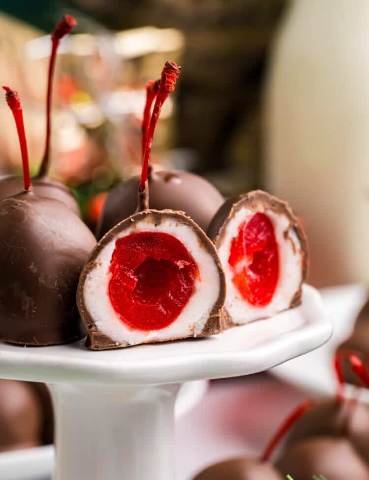 Chocolate Covered Cherries on pedestal serving platter cut open