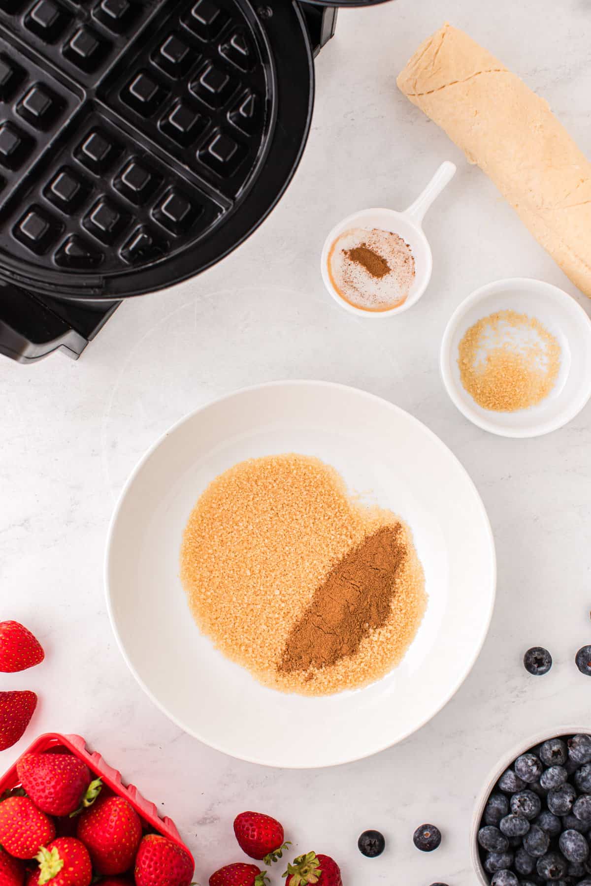 In a Small Bowl mix together the Cinnamon and Sugar. Set aside.