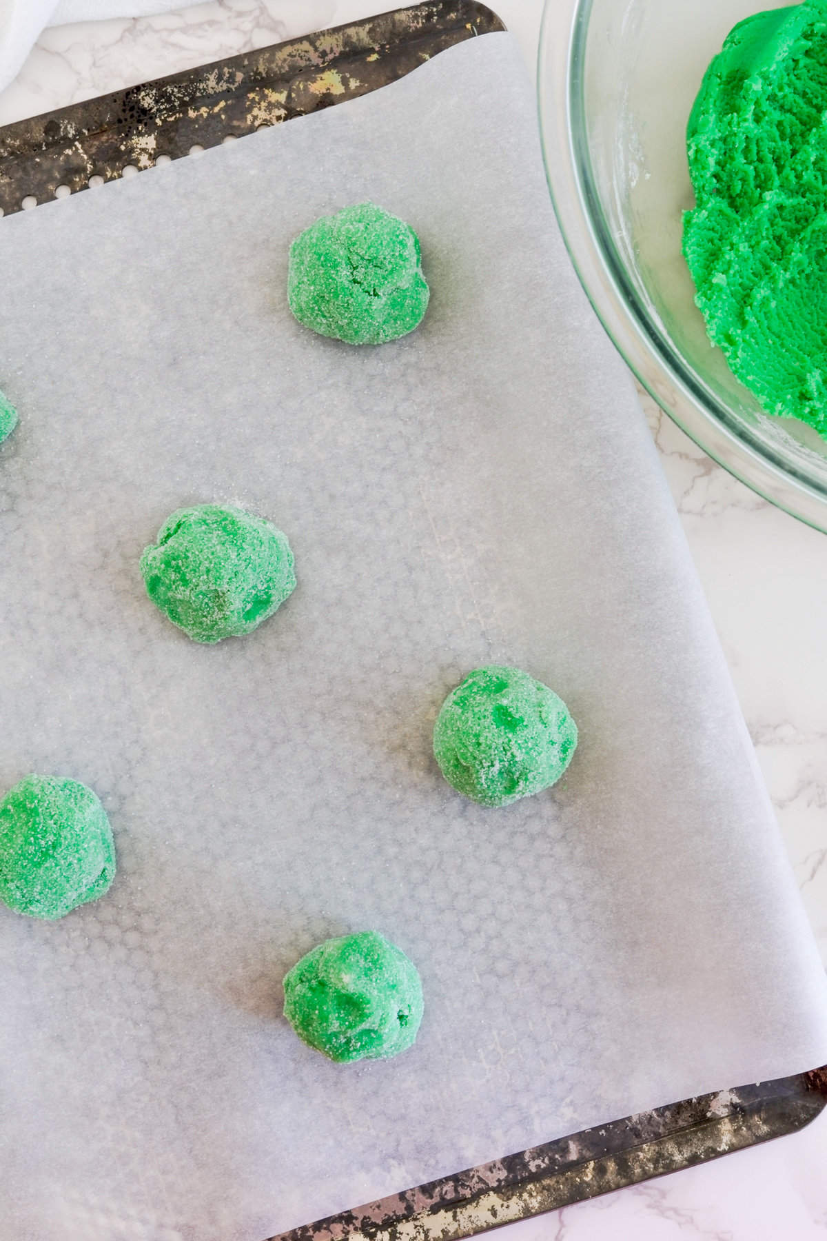 dough balls placed on the baking sheet.