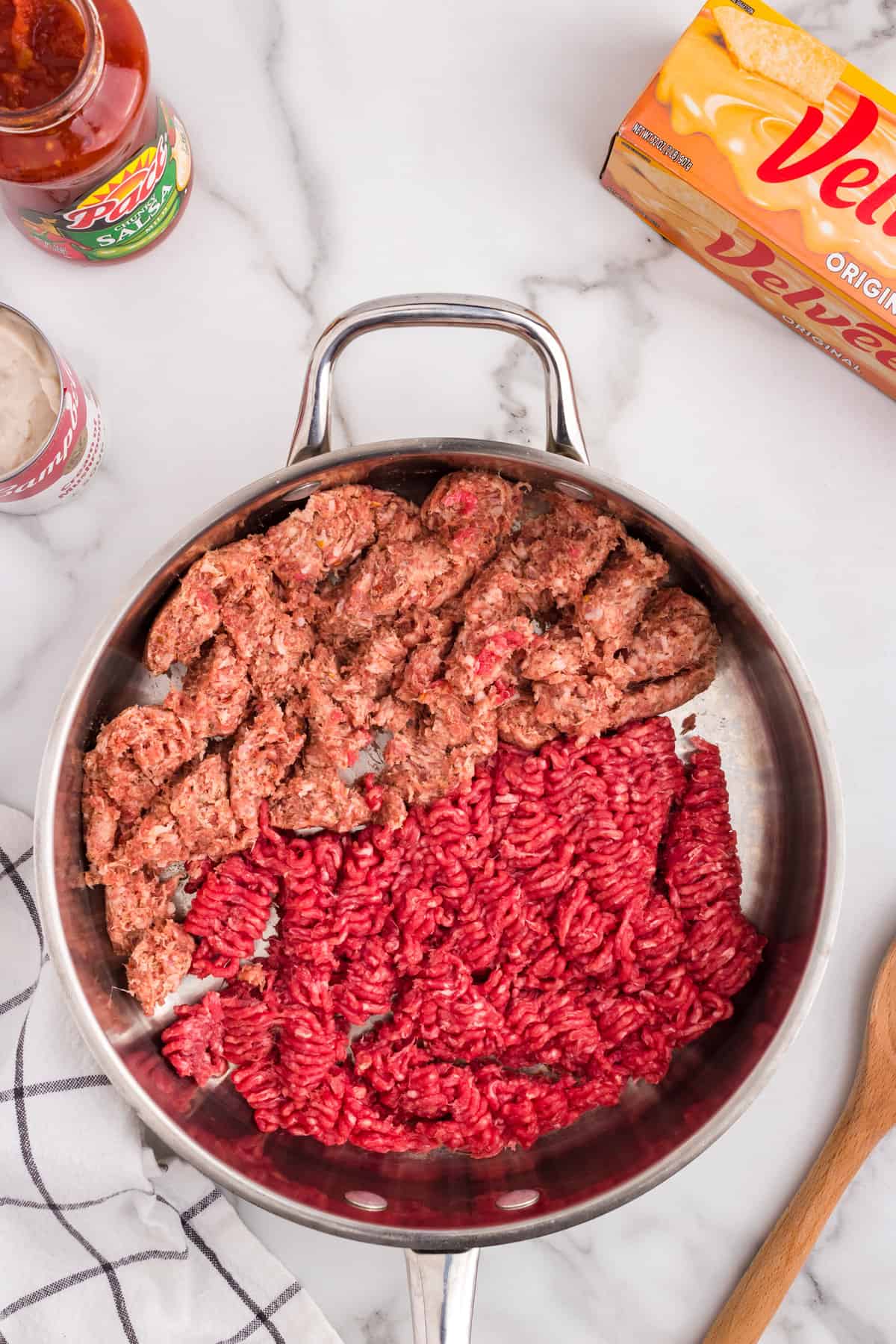 Meats in stovetop skillet for Crock Pot Hamburger Dip before browning 