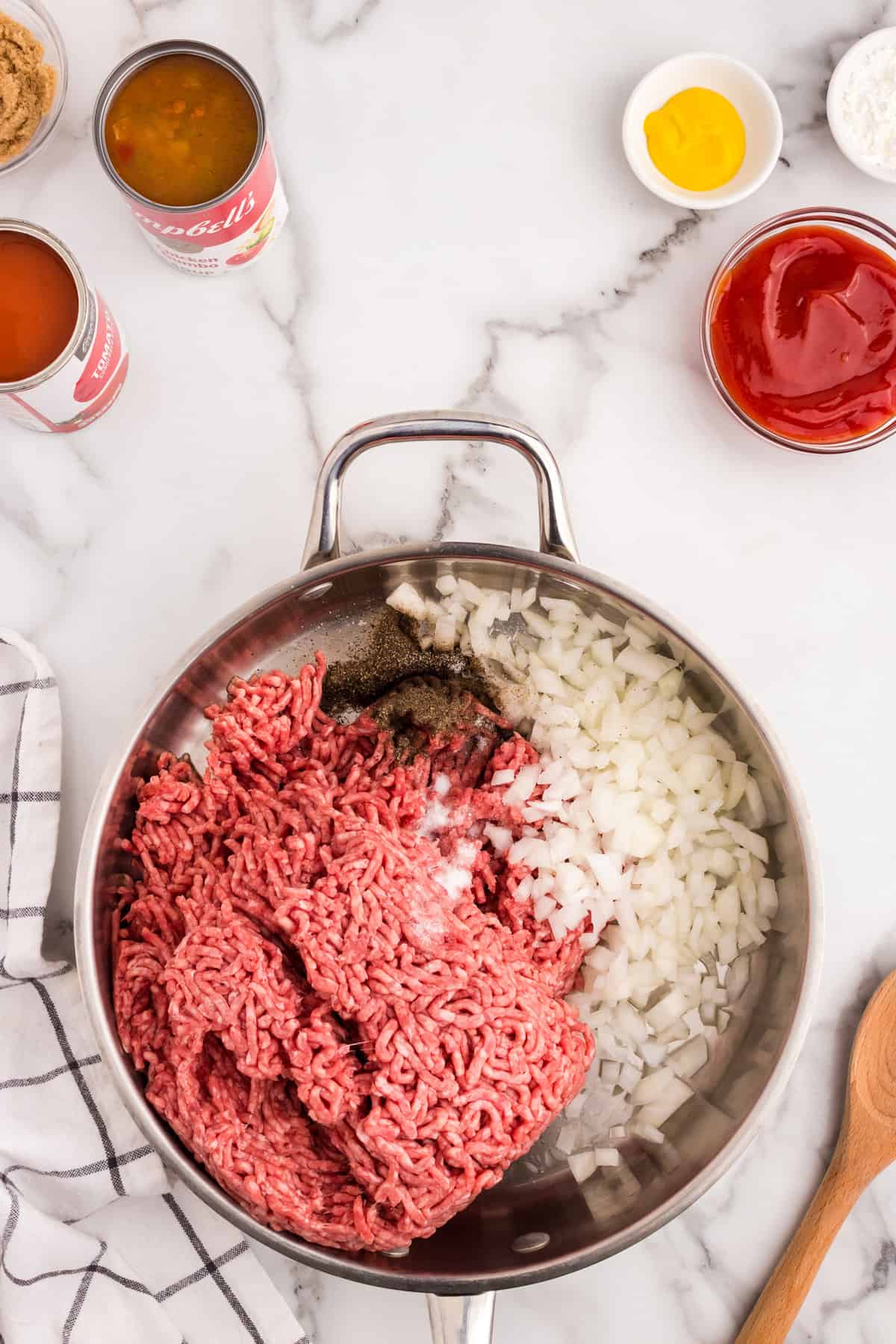 Ground beef and onion in skillet for Large Batch Sloppy Joes recipe