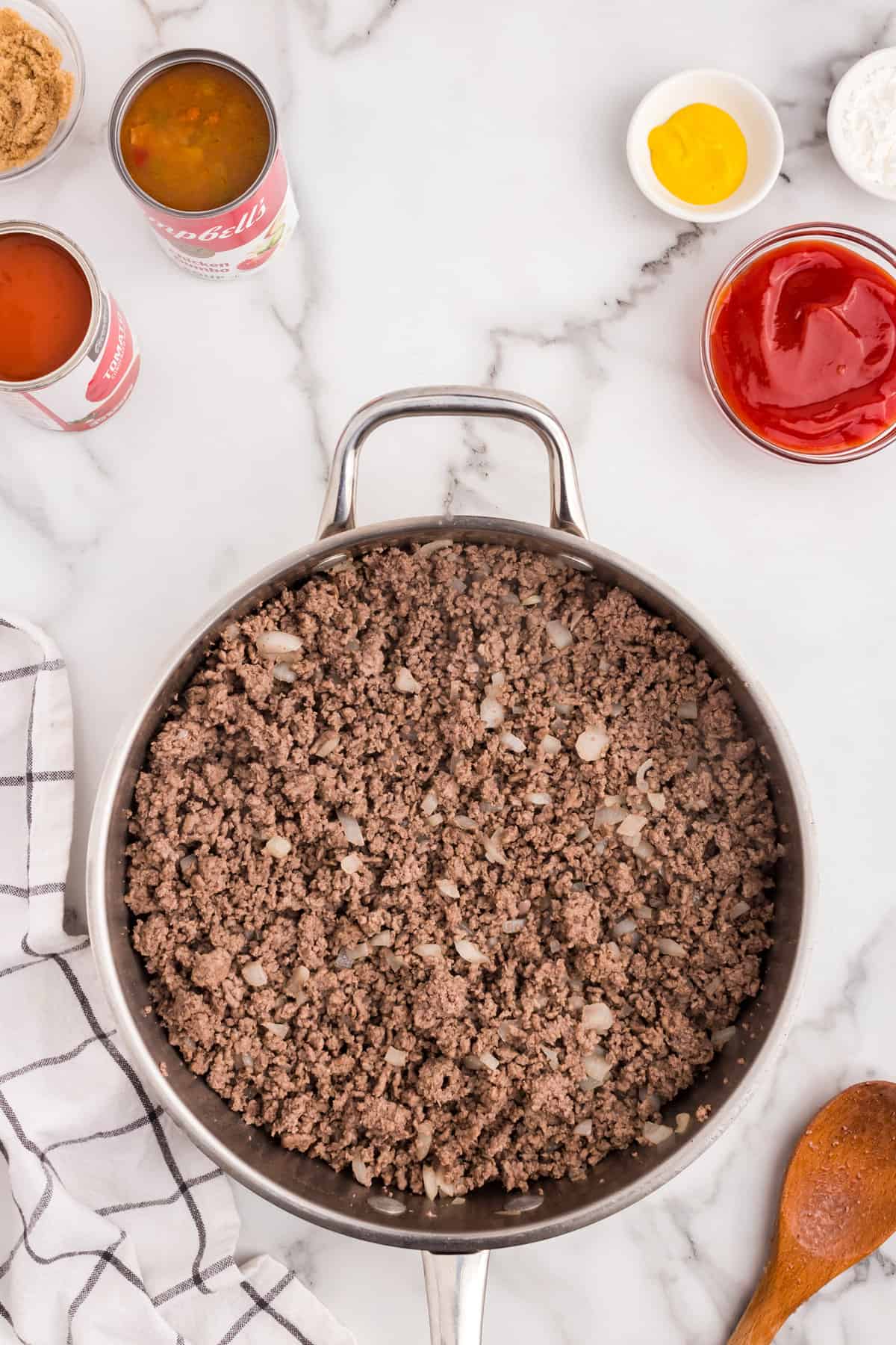 Browned ground beef in skillet for Large Batch Sloppy Joes