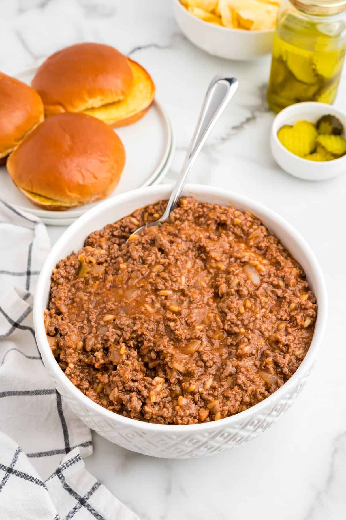 Large Batch Sloppy Joes in a serving bowl with spoon