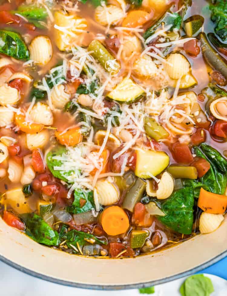 Minestrone Soup in soup kettle topped with Parmesan cheese