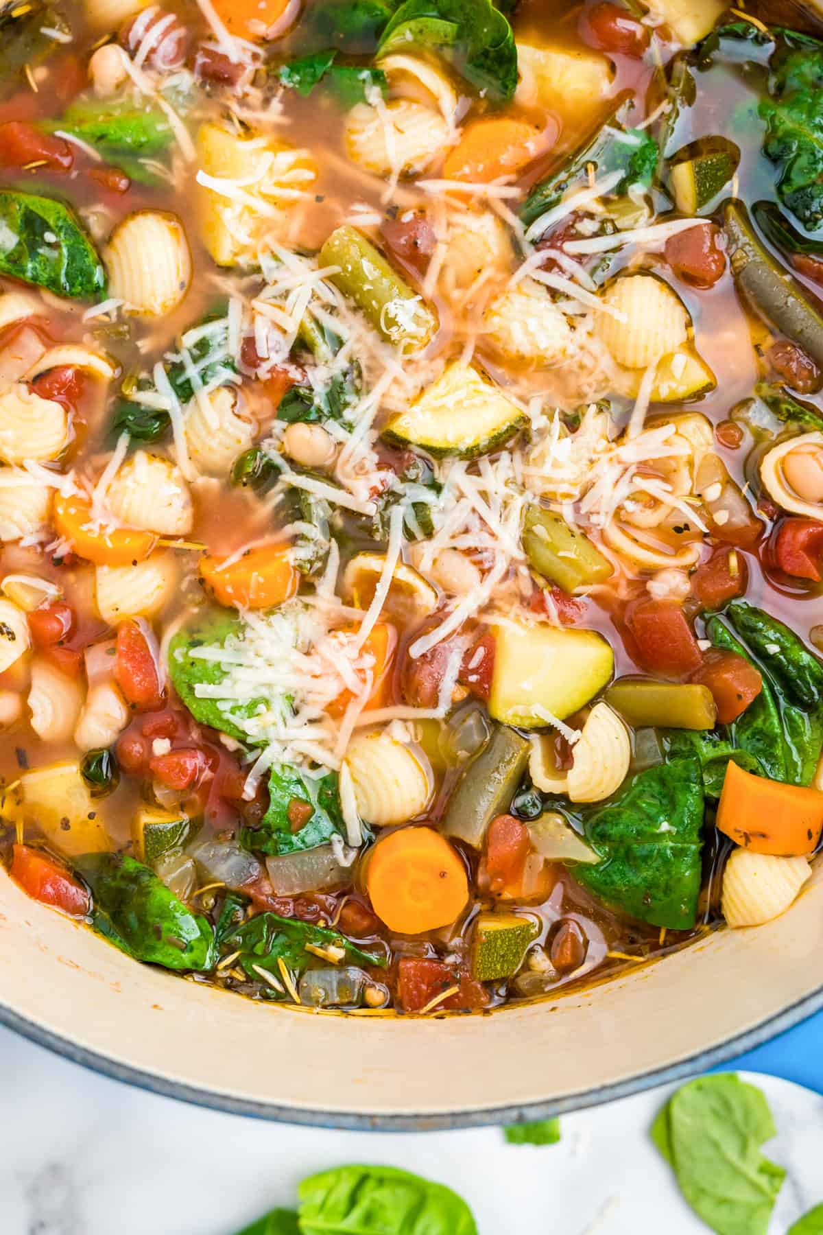 Minestrone Soup  in soup kettle topped with Parmesan cheese