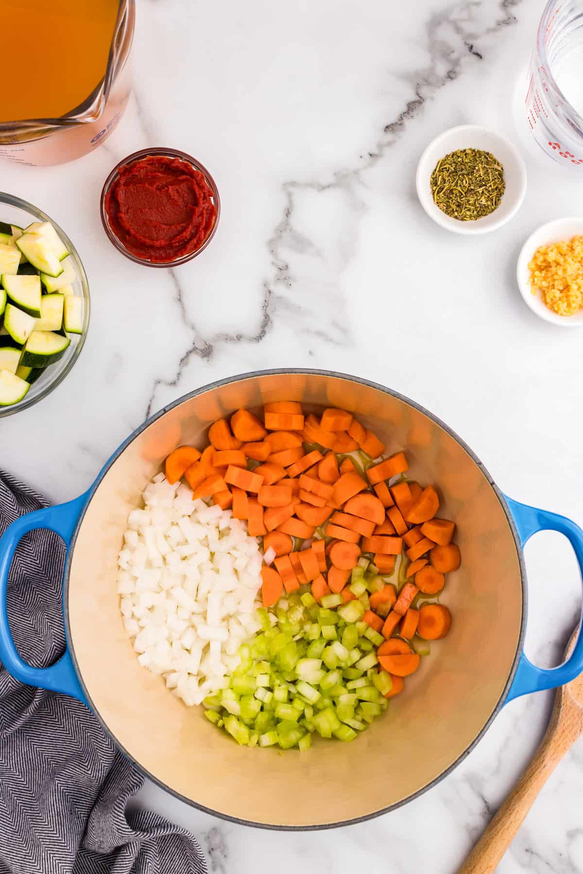 Chopped vegetable ingredients for Minestrone Soup recipe in dutch oven