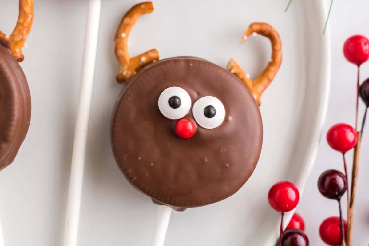Close up photo of one completed Reindeer Oreo Pop.