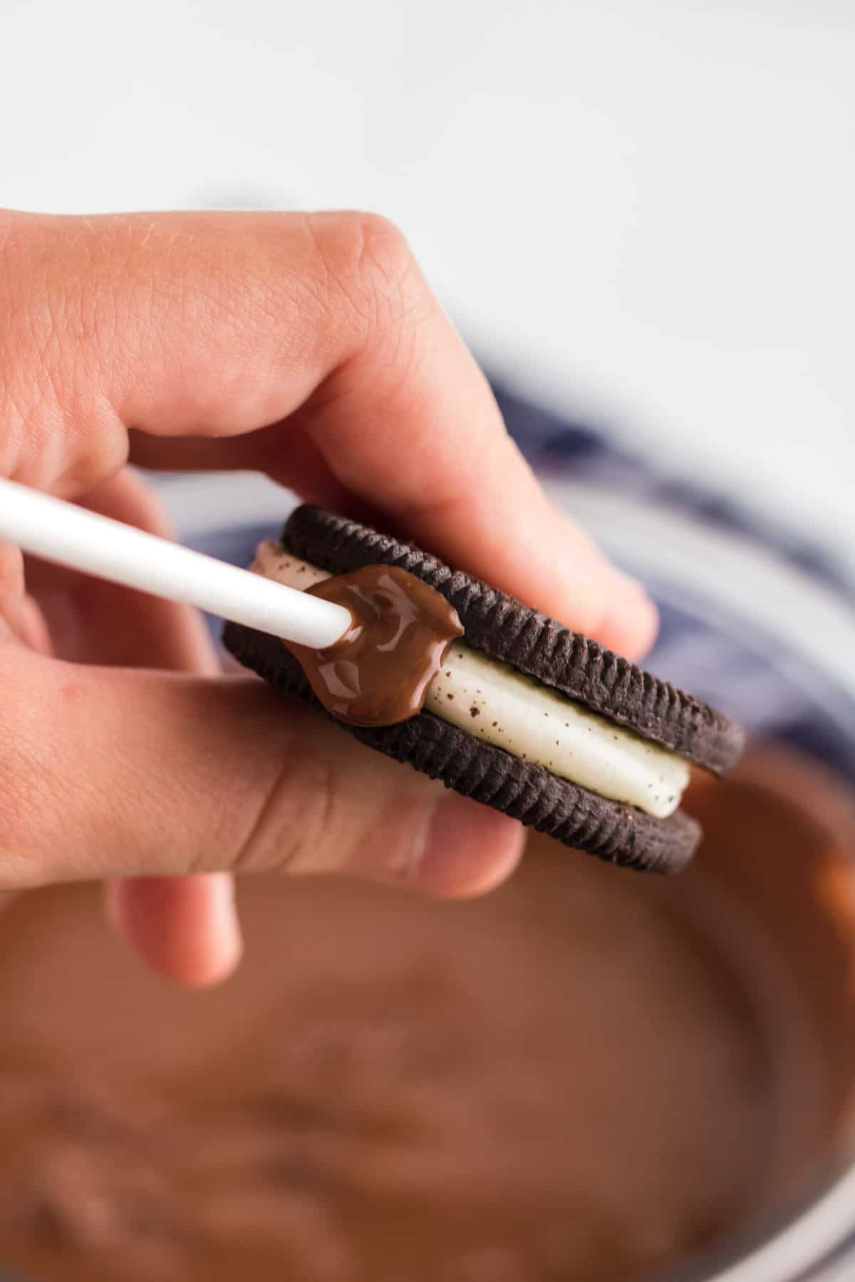 Sticking the Chocolate Covered End in the Oreo "Stuf"