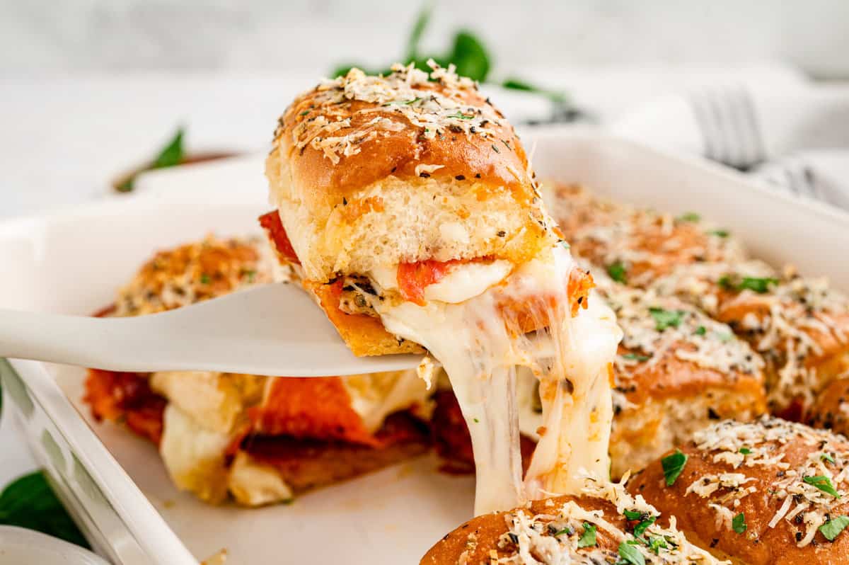 Using spatula to pull Pizza Slider from baking pan