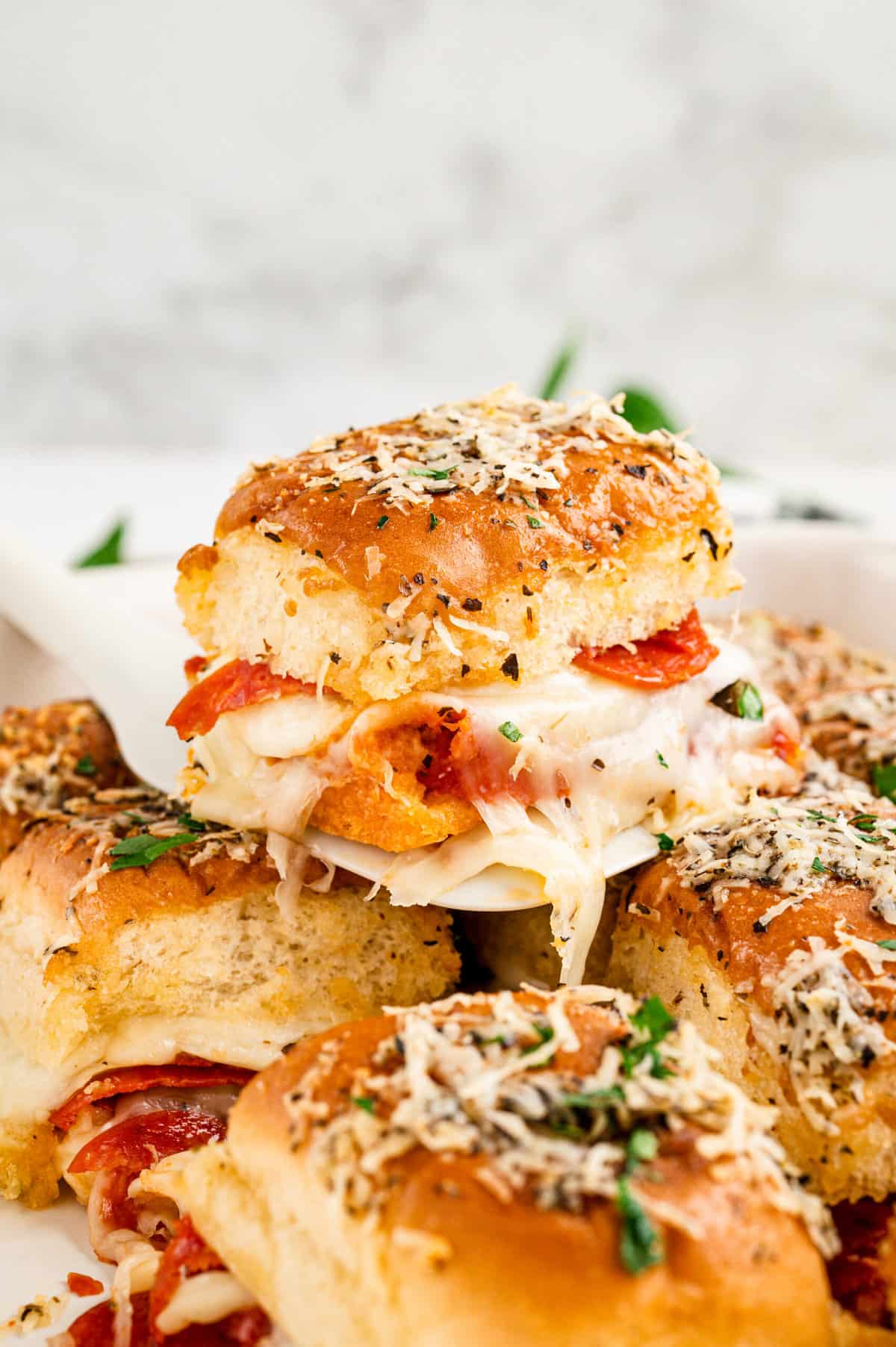 Using spatula to pull Pizza Slider from baking pan