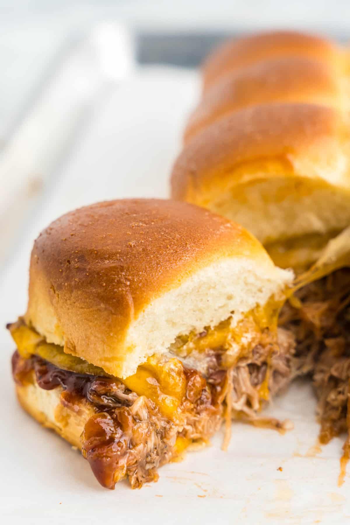 Leftover Pulled Pork Sliders pulled apart on tray