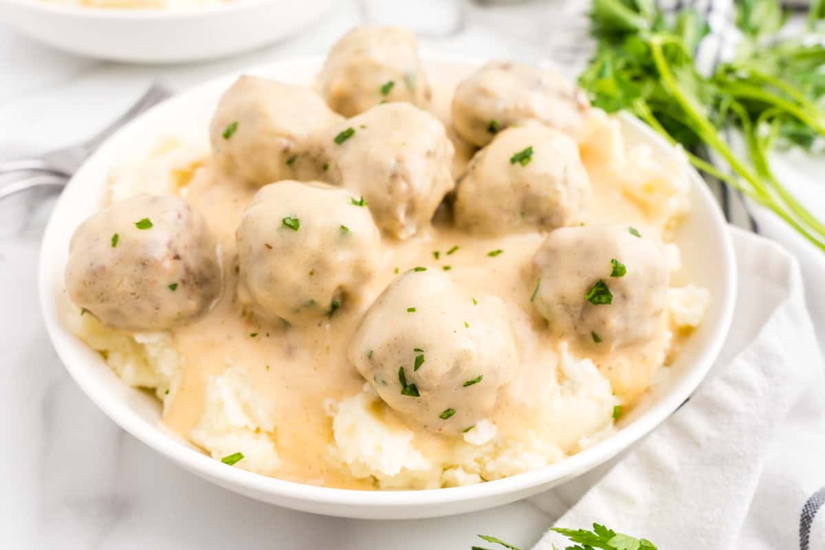 Bowl of mashed potatoes and Swedish meatballs