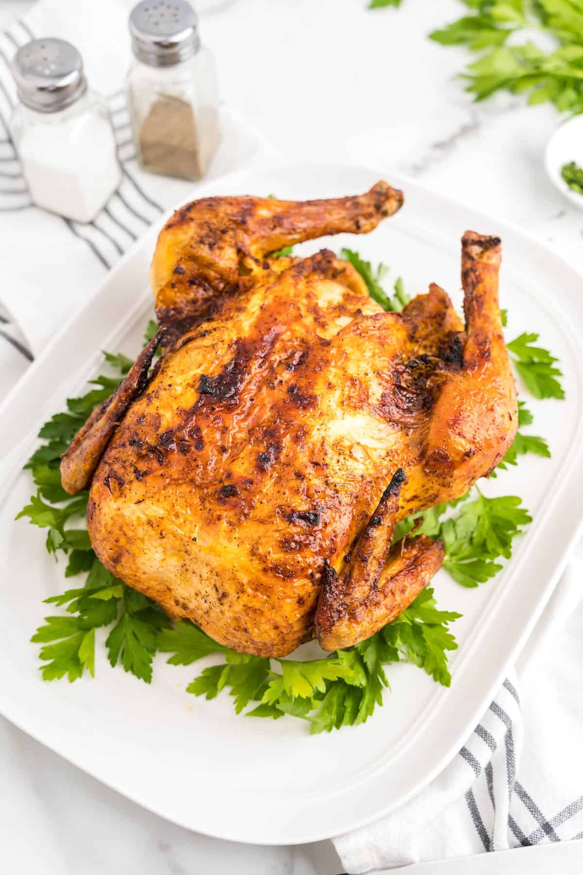 Air Fryer Roast Chicken on serving platter