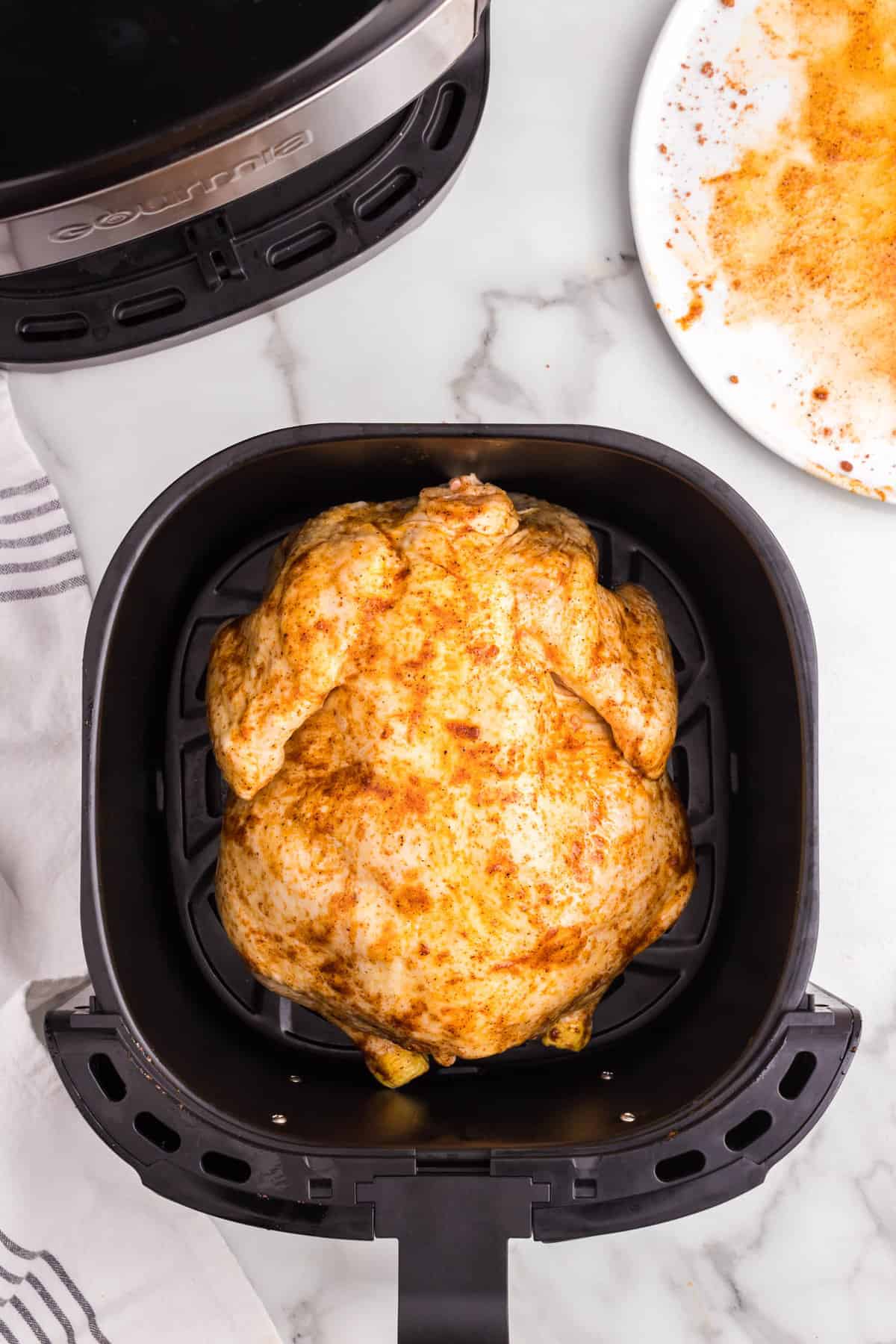 Seasoned whole chicken in air fryer for Air Fryer Whole Chicken Recipe