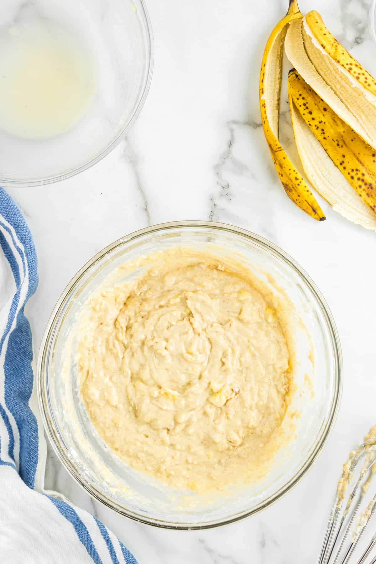 Combining Ingredients for Banana Pancakes Batter