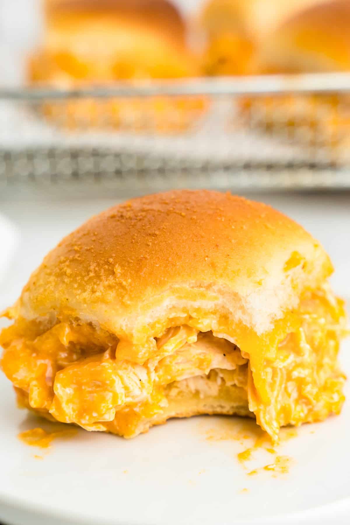 Buffalo Chicken Slider on plate with one bite taken