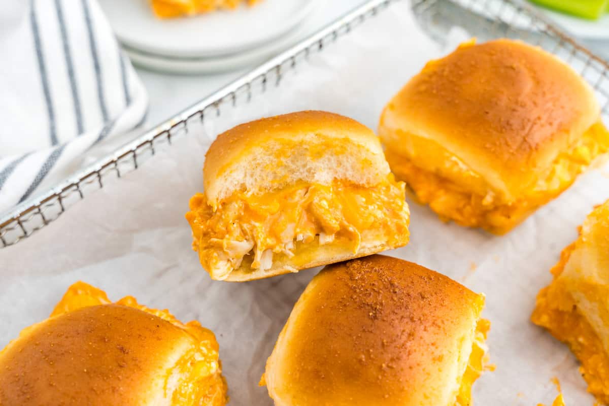 Buffalo Chicken Sliders Scattered on Serving Plate