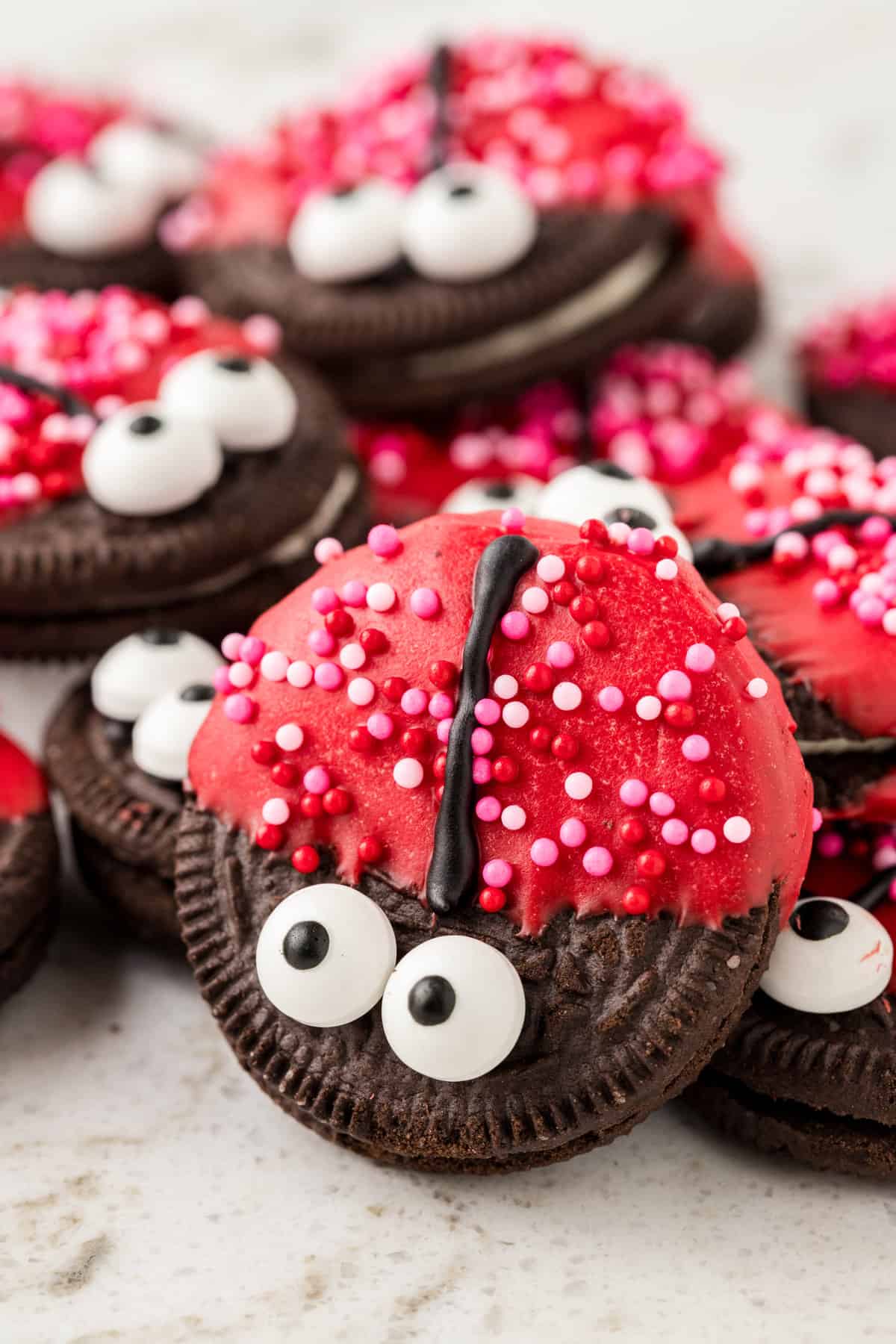 Ladybug Cookies stacked on serving plate ready to enjoy for Valentine's Day