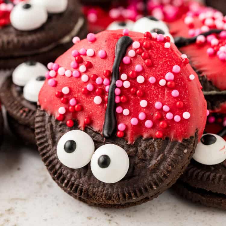 Ladybug Oreos stacked on serving plate make the perfect Valentine's treat