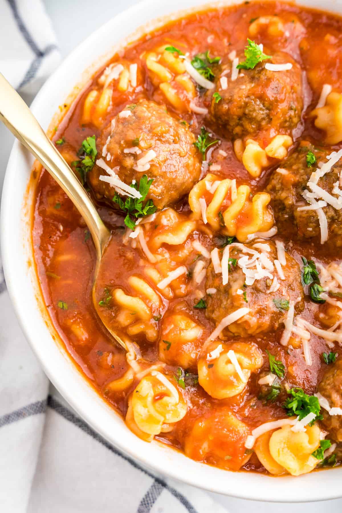 Italian Meatball Soup in bowl with spoon