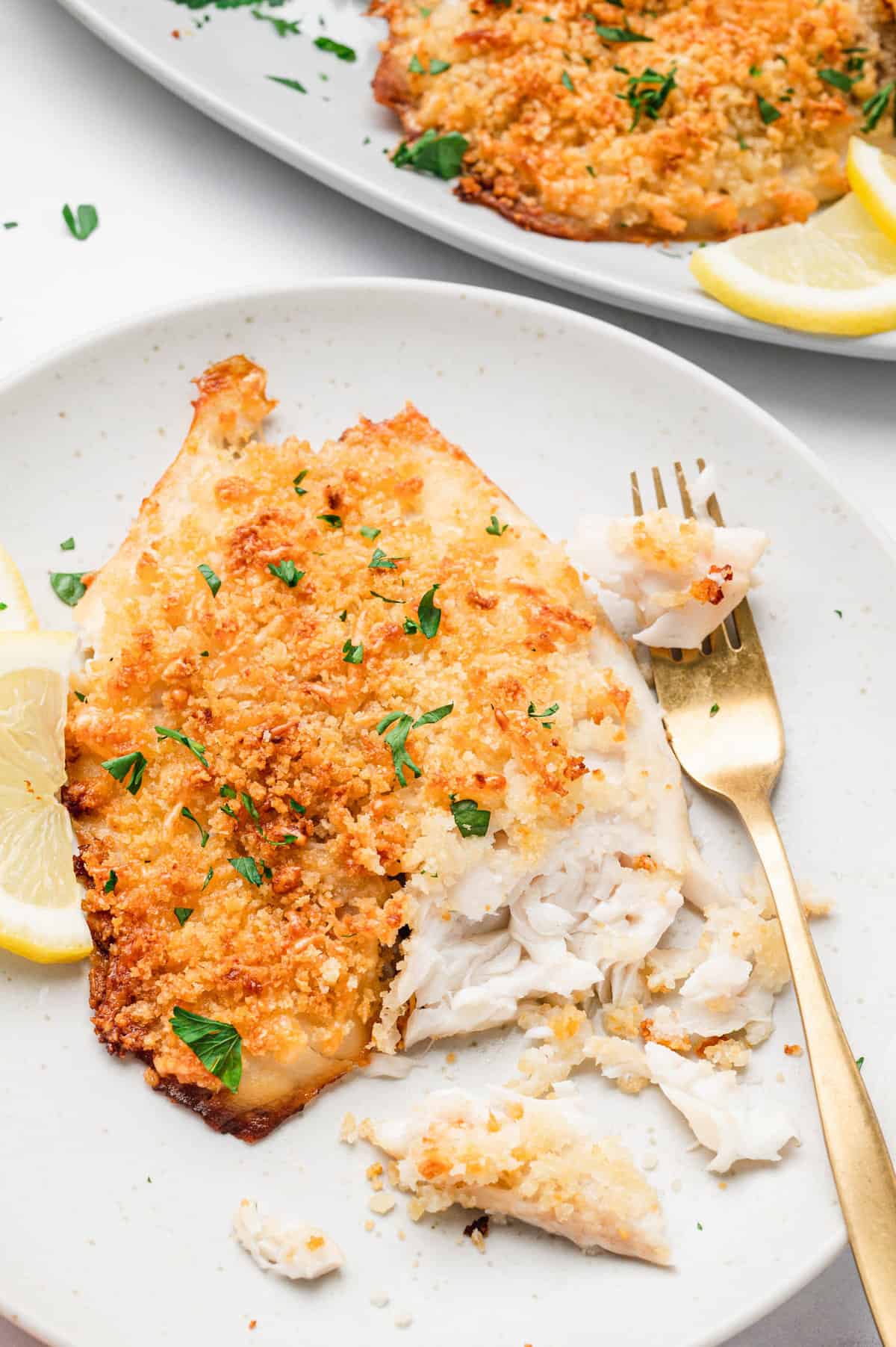 Parmesan Crusted Tilapia  on plate with fork