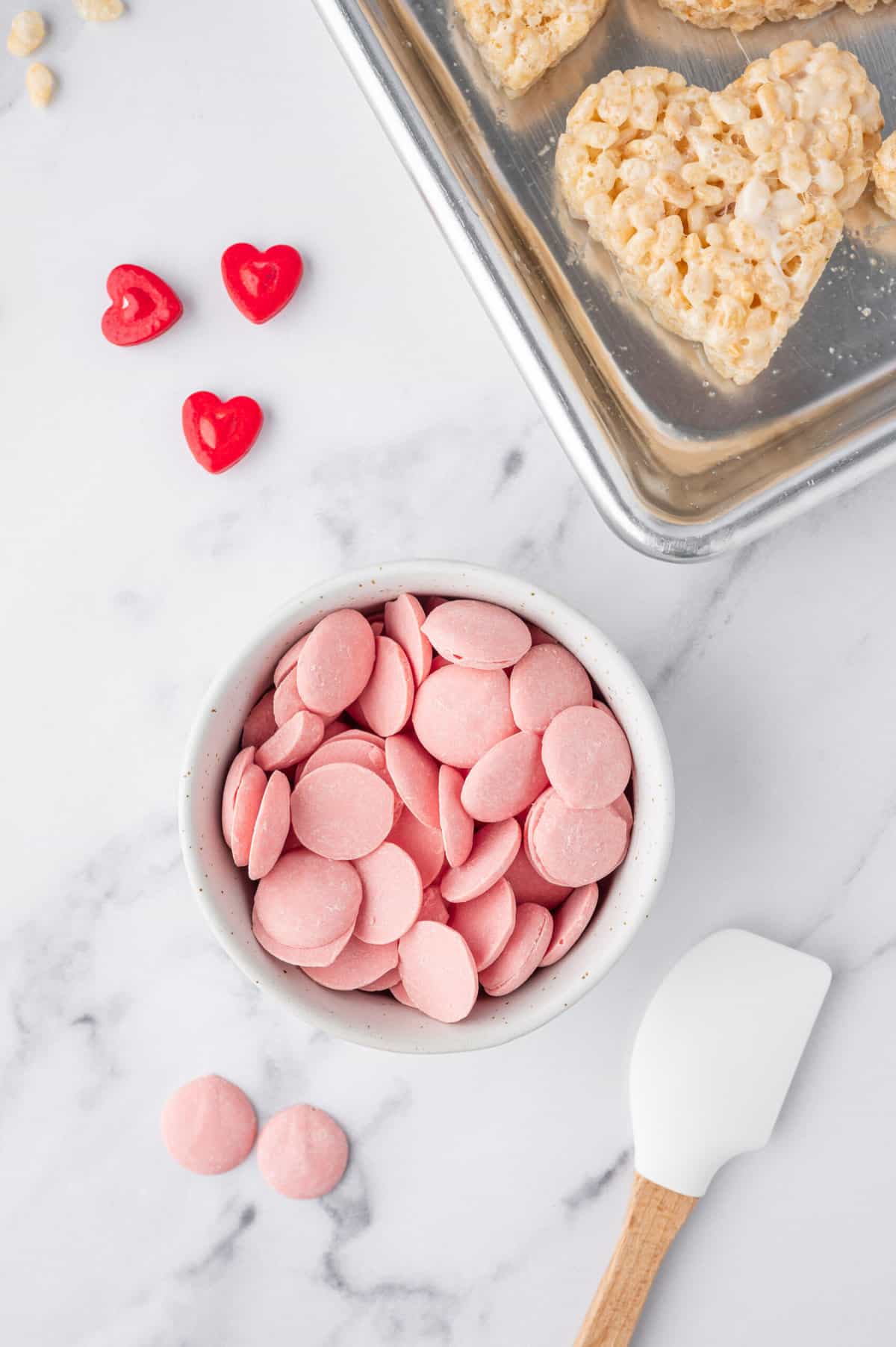 Melt the Pink Candy Melts in a microwave Safe bowl until fully melted.