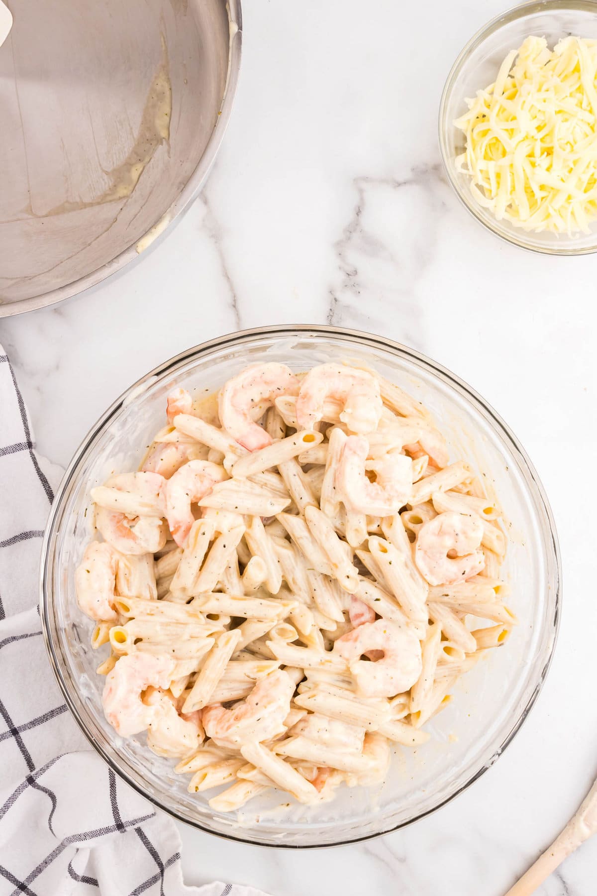 Tossed Shrimp Alfredo Casserole ingredients in mixing bowl