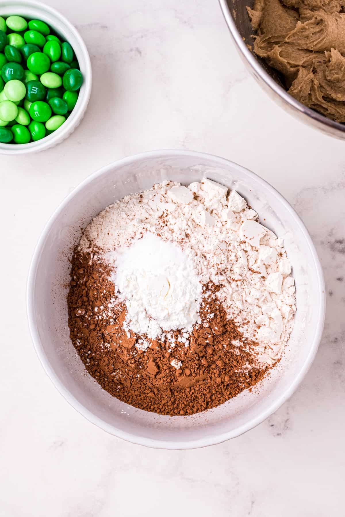 In a separate bowl whisk together flour, cocoa powder, cornstarch, baking soda, and salt.