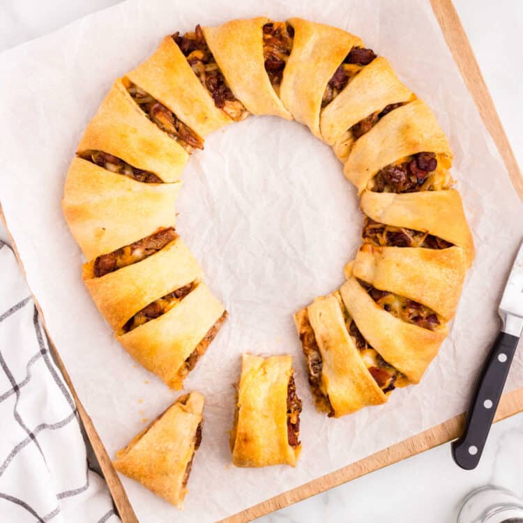Overhead Image of Square Pulled Pork Crescent Ring Image with slices cut and removed