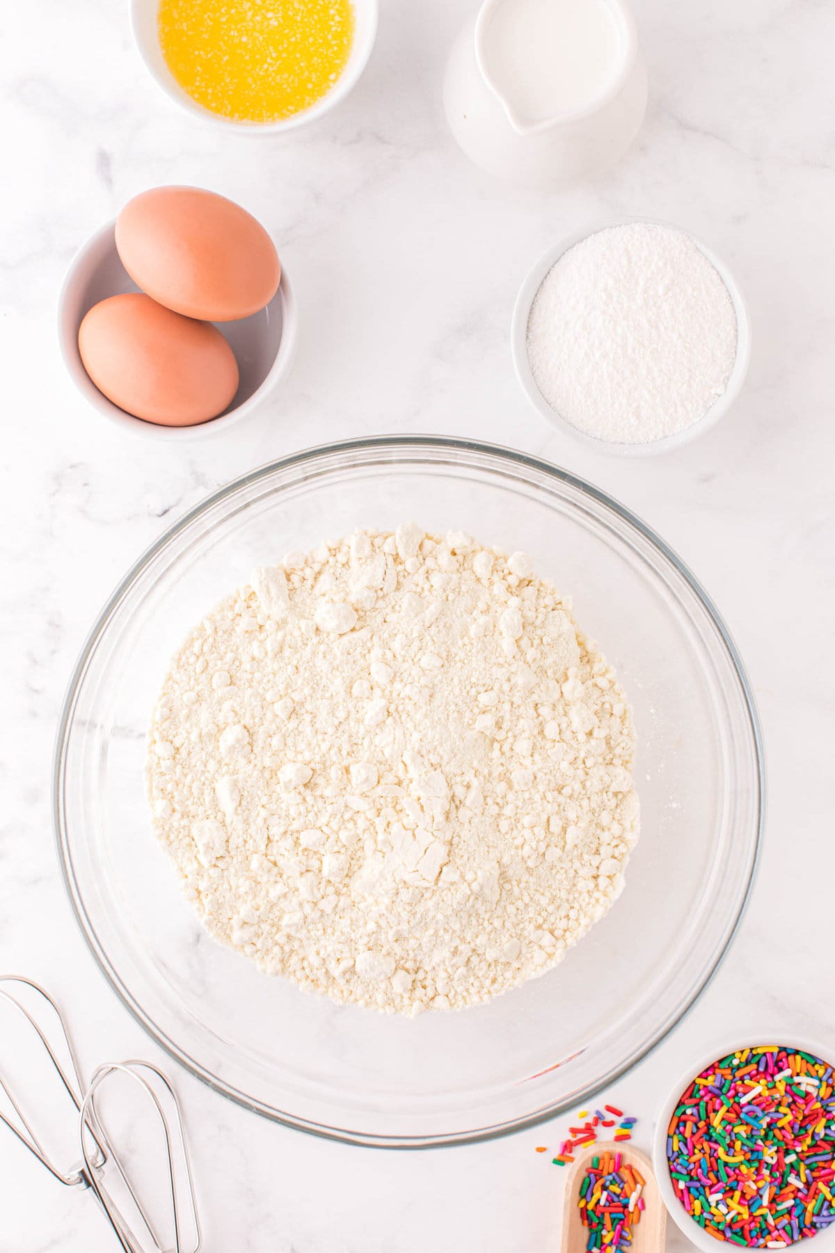 Pour the cake mix in a mixing bowl.