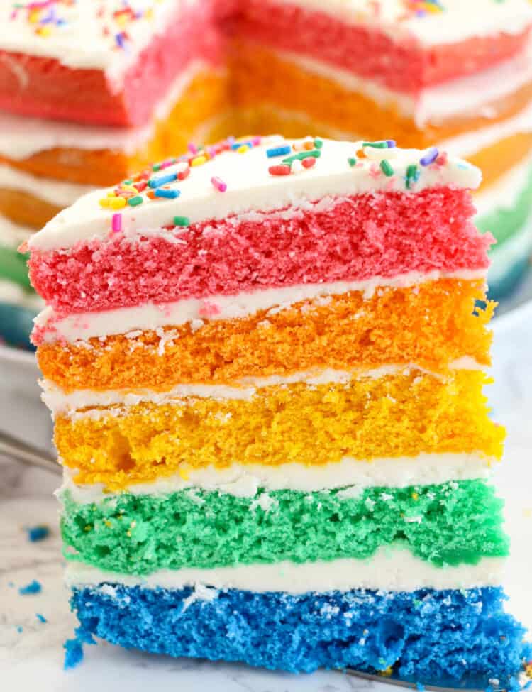 A slice of cake showing all of the layers of the cake.
