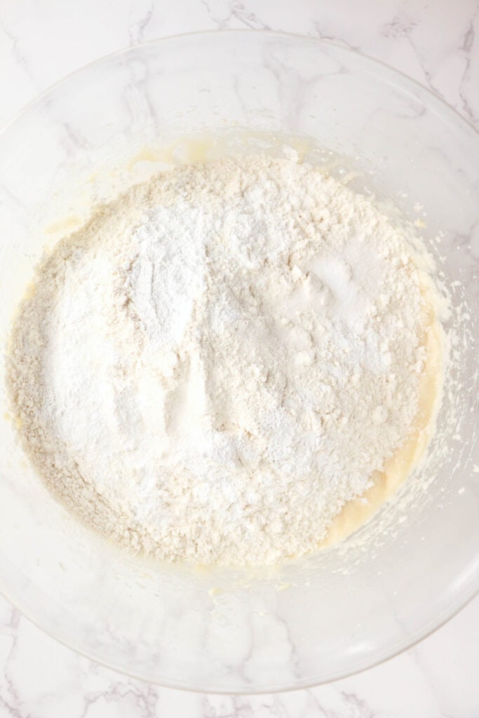 Add flour, baking powder and salt. Beat together until batter is smooth.