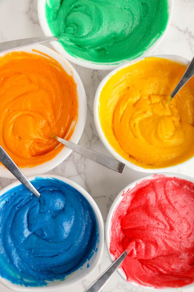 Separate batter into small bowls and add food coloring of your choice.