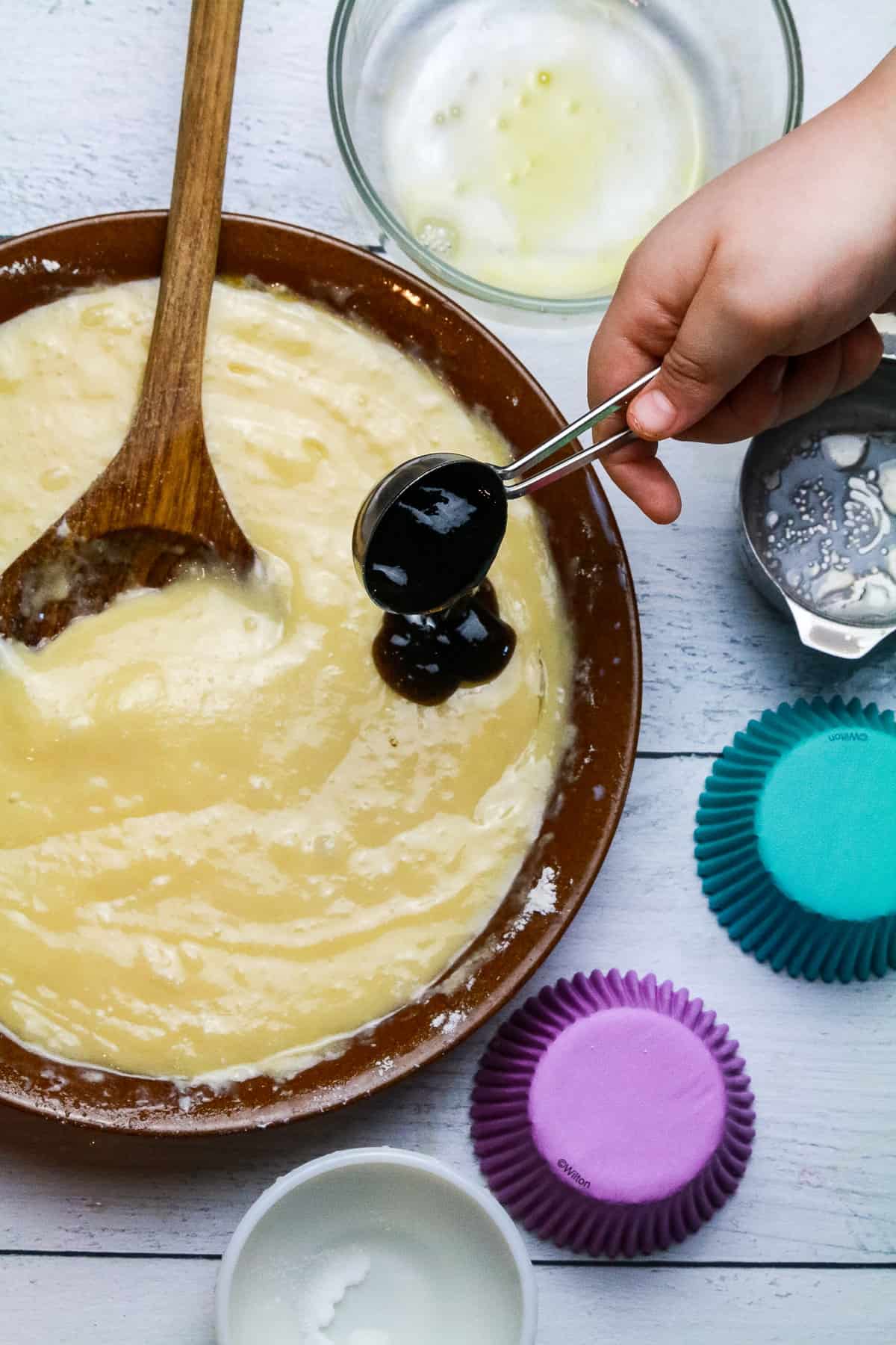 Add in the vanilla bean paste. Stir for 1-2 minutes to fully incorporate the paste throughout the batter.