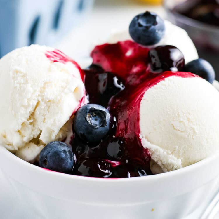 Blueberry Sauce on a bowl of vanilla ice cream