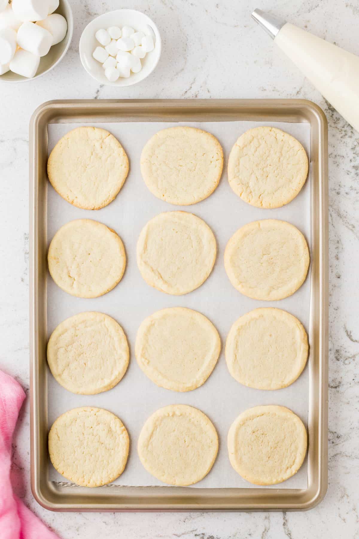 Cut the Cookie Roll into 1/2 inch slices and place on a baking sheet with parchment paper. Bake according to the package.